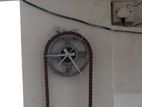 Sprocket with Chain Clock