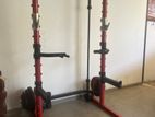 Squat Rack with Weights and Barbell