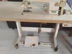 Sewing machine with clothes cutter