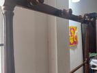Teak clothes rack with a hanger