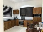 TEAK PANTRY CUPBOARDS WITH GRANITE TOP