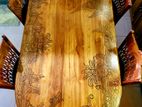 Teak Table with woodcarving + 6 Chairs
