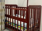 Teakwood Movable Baby Cot with Mattress, Bumpers and Pillows