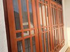 Timber window frame with a louvred fanlight
