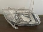 Toyota Axio 141 Genuine (Brand new) Headlight