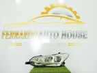 Toyota Axio 165 Genuine Brand New Headlight (12-595)