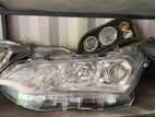 Toyota Axio head light 595