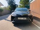 TOYOTA AXIO HYBRID - FOR RENT
