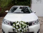 Toyota Axio hybrid wedding car for Hire