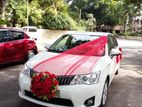 Toyota Axio hybrid wedding car for Hire