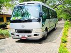 Toyota Coach AC Bus for hire with driver