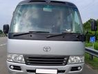 Toyota Coach AC Bus for hire with driver