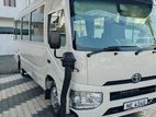 Toyota Coaster Ac bus for hire 27seat