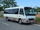 Toyota Coaster – Premium Mini Bus for Tours