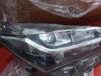 Toyota Vitz Ksp130 Head Light (Black Scoop)