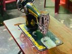 Traditional Sewing Machine With Wooden Table