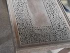 two small carved tables
