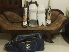 Used left handed cricket set with bat and duffle bag
