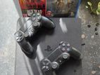 PS4 with Dual Controllers 2 Video Games