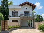 වෙල්‍යායකට මුහුන්ලා පිහිටි අලුතින්ම ඉදිකරන ලද දෙමහල් නිවස විකිනීමට(zxxx)