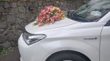 Wedding car rent Toyota axio hybrid
