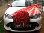 Wedding car rent Toyota axio hybrid