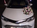 Wedding car rent toyota axio hybrid
