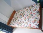 wooden bed