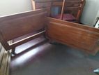 Wooden single beds
