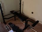 Workout Bench with Weights Included