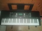 Yamaha psr e373 keyboard with stand .