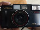 Yashica MF-2 Super DX 35mm film camera with pouch